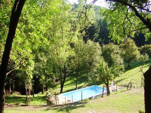 One bedroom house with shared pool furnished garden and wifi at Bibbiena