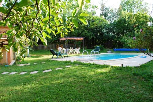 Maison d'une chambre avec piscine privee jardin amenage et wifi a Sainte Alvere