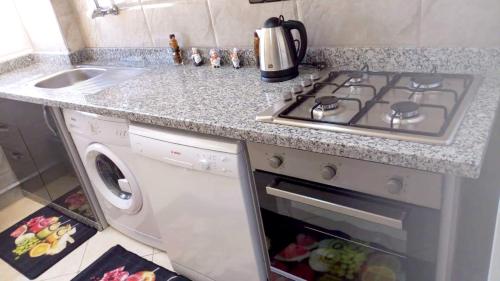 Kitchen, Modern Apartment in Agadir, 60 m², Garden View in Al Mohammadi