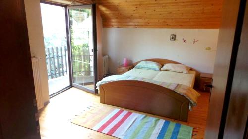 4 bedrooms chalet with lake view jacuzzi and furnished garden at Sibiel