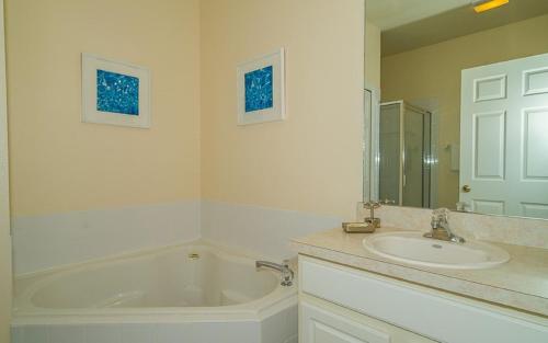 Morningside Vista- 4 bedroom home with a private pool & spa game room and resort amenities - image 12