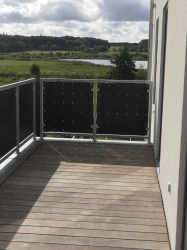 Balcó/terrassa, Hus med søudsigt in Brabrand