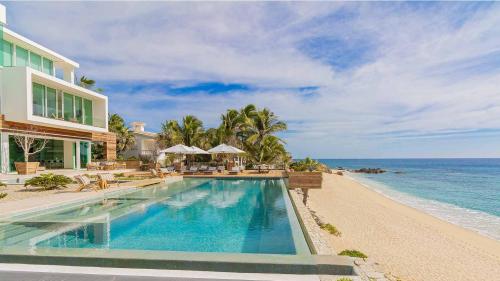 Ultra Modern Beachfront Villa with Full Staff