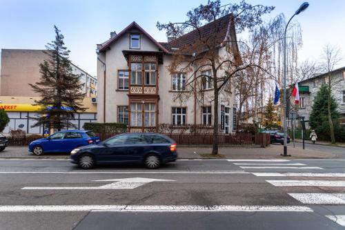Two-Bedroom Apartment room in Victus Elegant Apartment Close to the Beach by Noclegi Renters