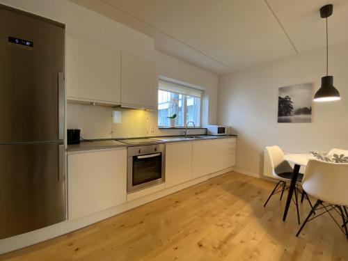 Kitchen, Newly Built 1 Bedroom Apartment With Balcony near Læge Philipp Harbig