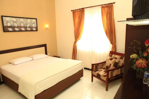 Deluxe Double Room room in Arya Graha Semarang