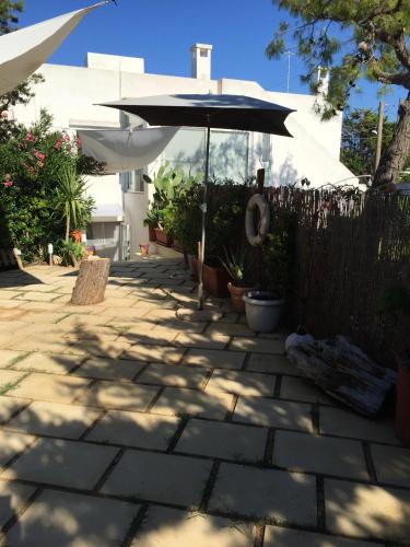 One bedroom house at Rosa Marina 20 m away from the beach with enclosed garden and wifi