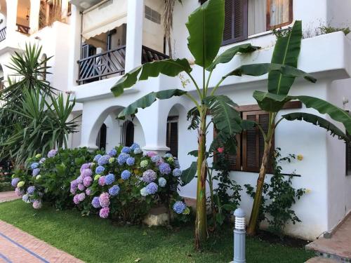 Vista exterior, Spacious apartment with terrace in Cabo Negro, 70 m² + Pool in Cabo Negro