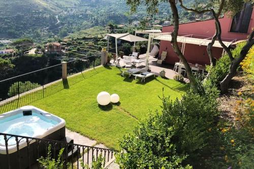 3 bedrooms villa with sea view jacuzzi and enclosed garden at Cefalu 2 km away from the beach