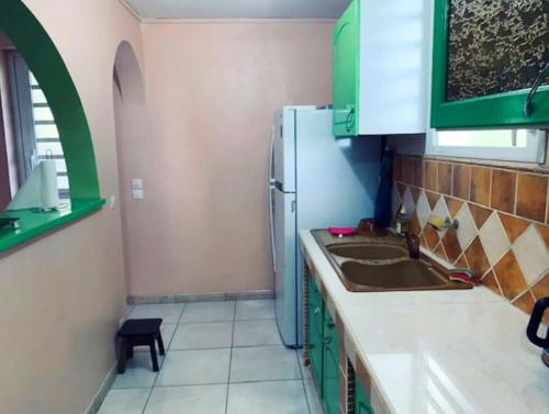 Κουζίνα, Appartement de 2 chambres avec jardin clos et wifi a Ducos in Ducos