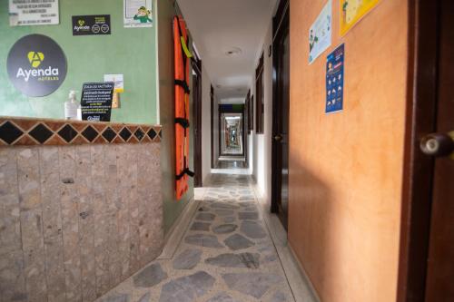 ล็อบบี้, Hotel Ayenda Calypso 1142 near สนามบินนานาชาติมาเตกาญา