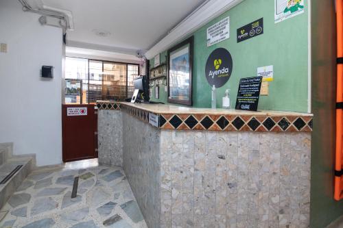 ล็อบบี้, Hotel Ayenda Calypso 1142 near สนามบินนานาชาติมาเตกาญา