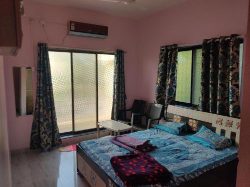 Gulmohar Cottages - Home Stay in Alibag