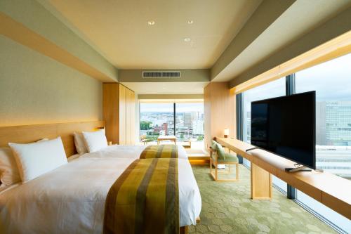 Deluxe Corner Twin Room with Tatami area for 3 Persons