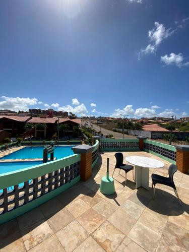 Linda casa Porto das Dunas: 4 suítes, churrasqueira e piscina