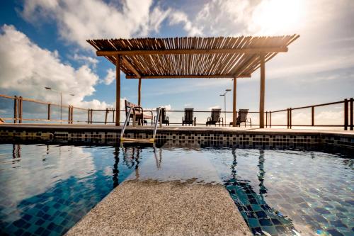 مسبح, Porto Suites Natal Hotel in ناتال