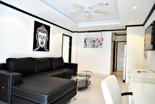 Room in Condo - Stylish 1 bed apartment at Jomtien Beach Condominium พัทยา