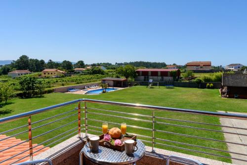  4 bedrooms house with shared pool jacuzzi and enclosed garden at Sanjenjo in Sanxenxo