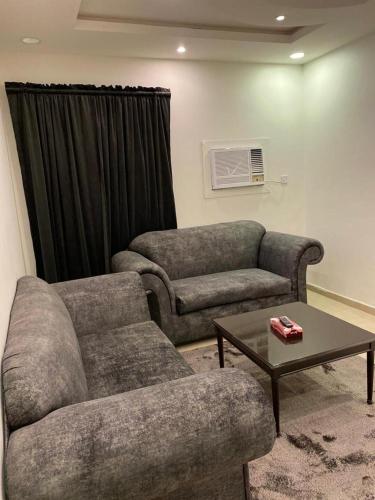 a living room filled with furniture and a couch, Al Fanar Al Alamaya 3- Hay'aa Malakeya entrance in Yanbu
