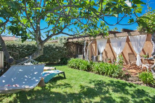 maison kiwi avec piscine chauffée terrasse jardin et bbq à Calvi gîte à louer Villa Alivi