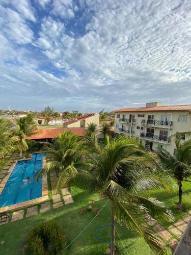 . Apartamento com vista para o mar, piscina , deck , playground e estacionamento .