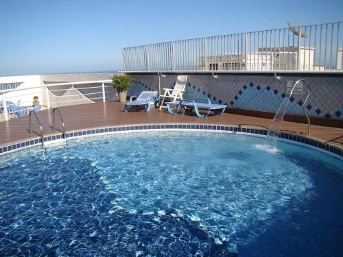 Apartamento com PISCINA no CENTRO de Guarapari ao lado da PRAIA
