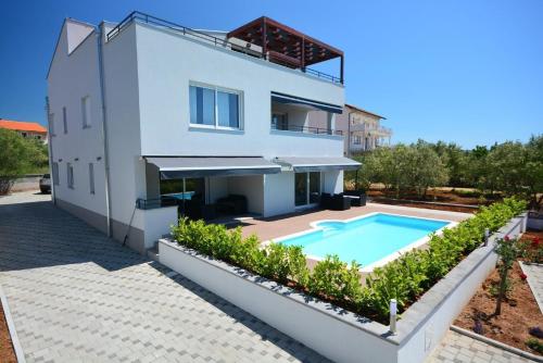 Apartment 1 with the swimming pool