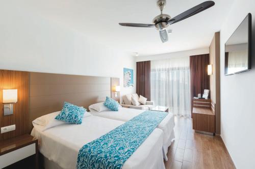 Hotel Riu Bravo - 00 All Inclusive Set in a prime location of Majorca, Hotel Riu Bravo - All Inclusive puts everything the city has to offer just outside your doorstep. The property features a wide range of facilities to make your stay