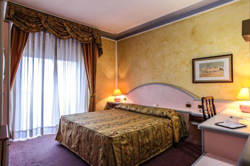 Cama, Hotel Grazia Deledda in Sassari