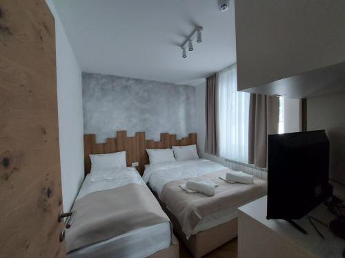 1 double bed, 1 twin bed, 1 sofa bed