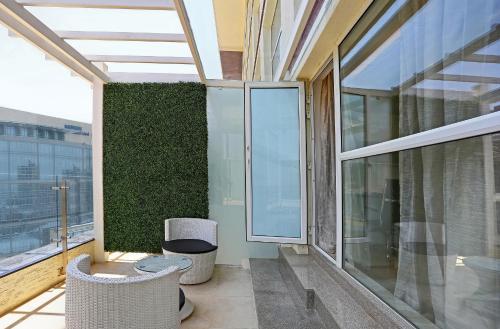 Balcony/terrace, Bhagini Icon Premier Hotel in Marathahalli