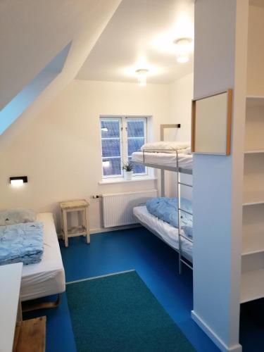 Femmasteren Hotel & Hostel Room Type - Family Room with Shared Bathroom