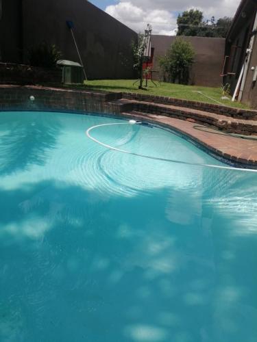 Swimming pool, Naisar's Apartments Primrose,Johannesburg in Johannesburg City Centre