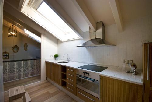 Kitchen, Las Casas Rurales Huerta San Benito in Pilona