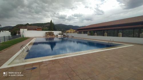 泳池, Apartamento rural "LA MUELA" in 比利亞耶爾莫薩德爾里奧