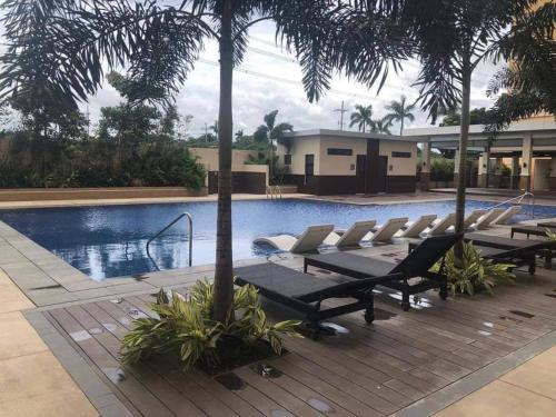Swimming pool, Neat Unit in Holland Park Southwoods in Binan