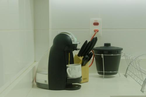 No CENTRO de Cascavel, atras do Ibis, confortavel e bom gosto