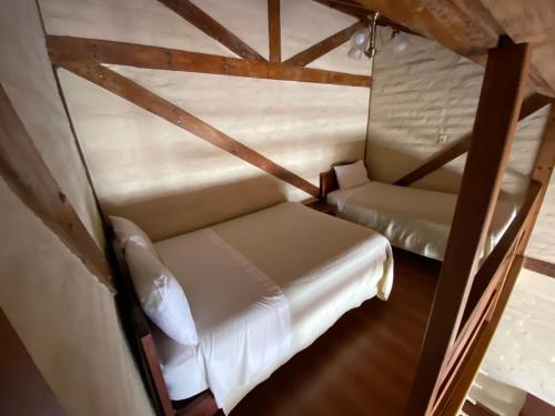 1 queen bed, 1 double bed, 1 twin bed