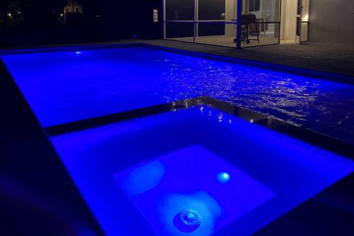 Stylish Getaway with Pool and Spa Less Than 2 Mi to Beach - image 2