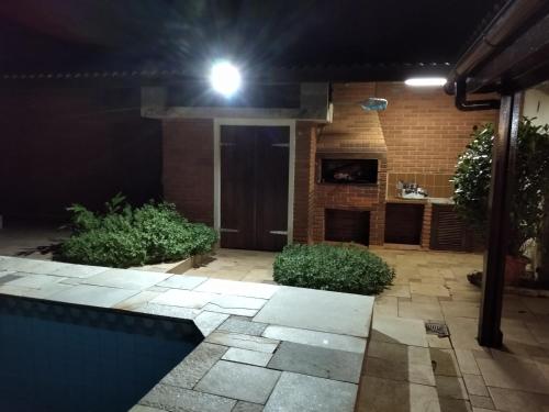Casa com piscina em condomínio fechado no Guarujá, São Paulo (fotografie 8)