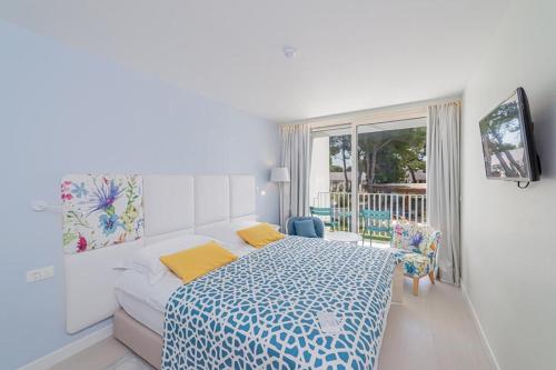 Family Room with Balcony and Courtyard View