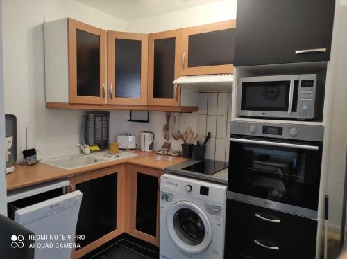 Cocina, Les appartements d'Au Coin Du Spa in Boulogne-sur-Mer