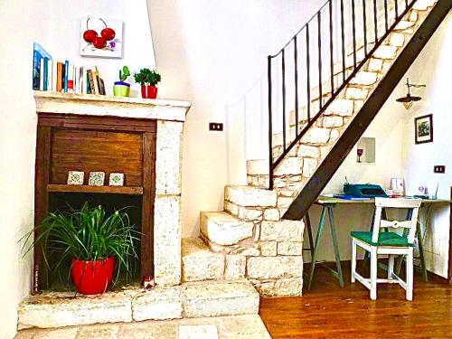 Antiche Mura Apartments "Nel Cuore della Puglia"bivani, cucina, terrazzo