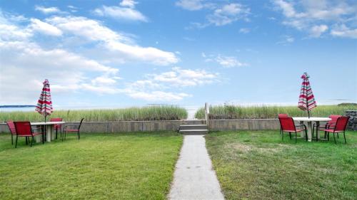 Sandy Beach at Starboard Oceanfront Condo Gorgeous Front Yard - main image