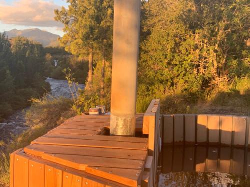 Domo Conguillio Conecta con tu energía sagrada junto al Salto Truful Truful con una vista majestuosa que podrás disfrutar en una tinaja Una experiencia que alineará tu espíritu y tu energía interior Vívelo