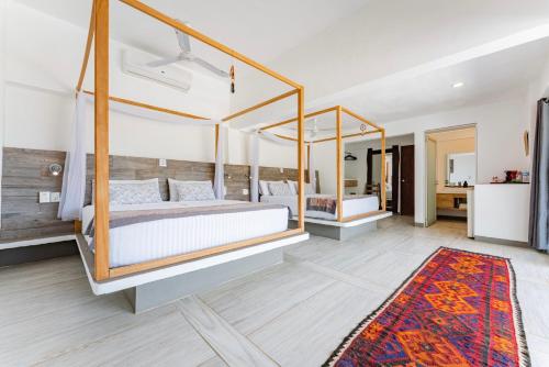 Villa Aikia (Adults Suites A/C) Room Type - Master Two King bedroom with Balcony Villa Aikia (Adults Suites A/C) Room Type - Master Two King bedroom with Balcony