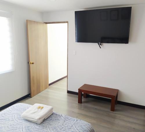 One-Bedroom Apartment room in 9 Apartaestudio minimalista independiente Cedritos