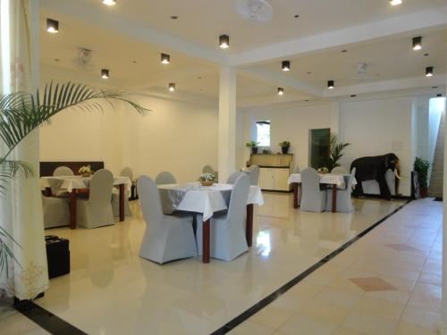 레스토랑, 그린 랜드 게스트하우스 (Green Land Guest House) in 핀나왈라