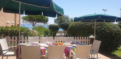 Casa con jardín a 25 metros de la playa. LA T. gîte à louer Cala de la Fosca