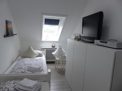 Kajüte 23, Nieblum (foto 8)